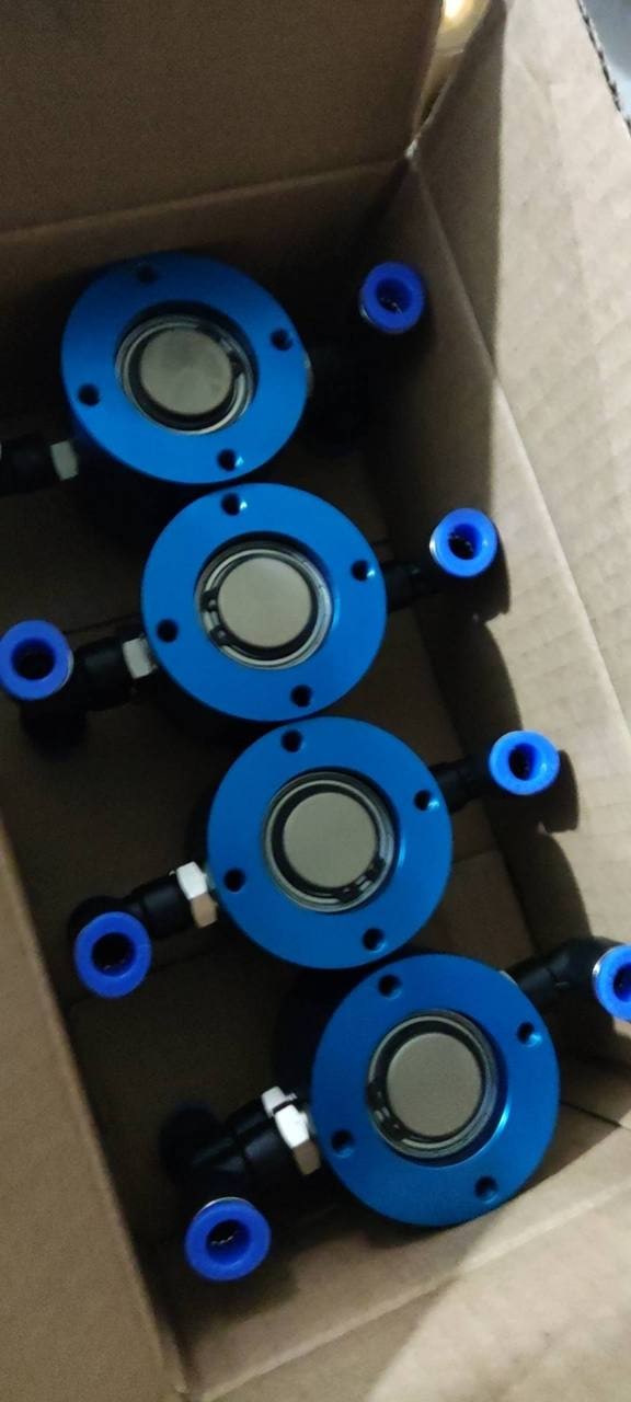 Multiple blue anodized pneumatic rotary unions arranged in a carton