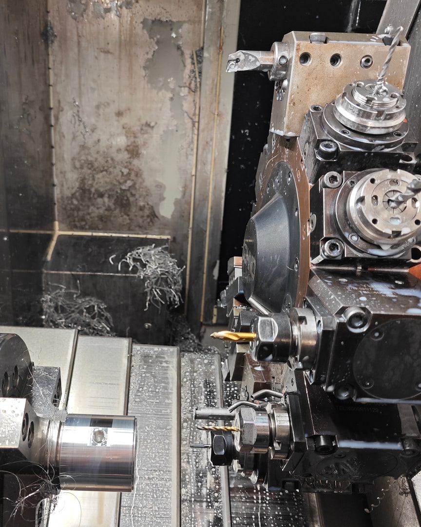 Stator-housing workpiece during 4-axis turn-mill machining